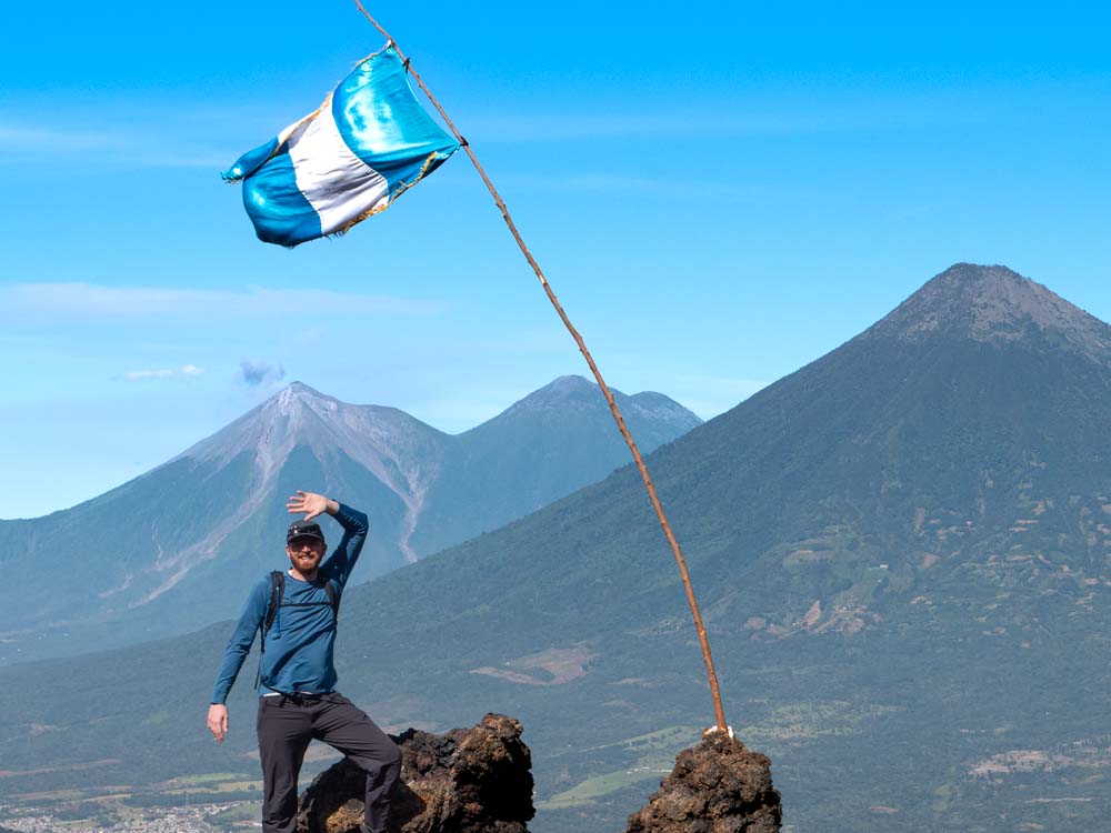 Man taking photo on Pacaya Volcano in Guatemala