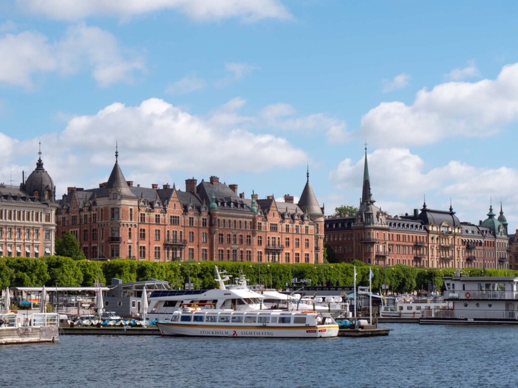 a large building with many boats in the water