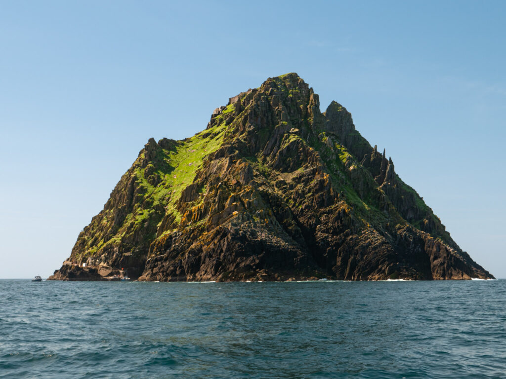 Small boat approaches Skellig Michael Island