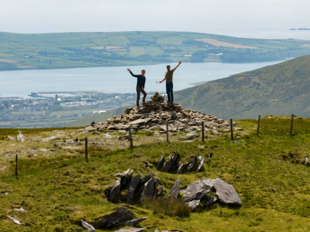 Two men standing on a mountain