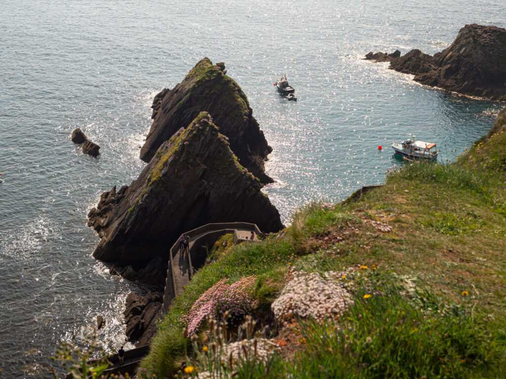 Large rock formations jutting up from the ocean