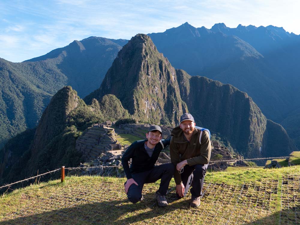 Two men taking photos at Machu Picchu
