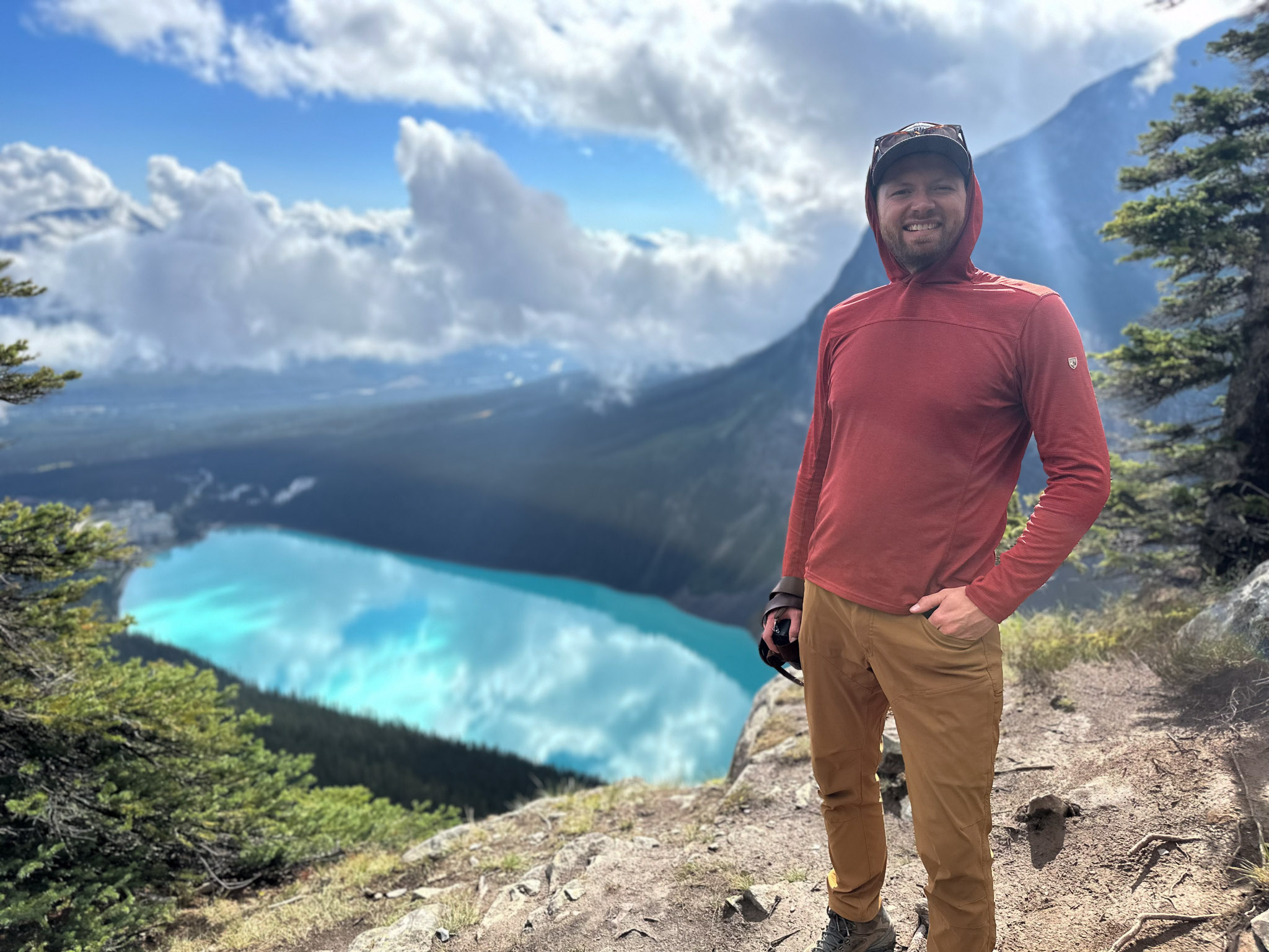 Hiker taking photo atop the Big Beehive in Banff