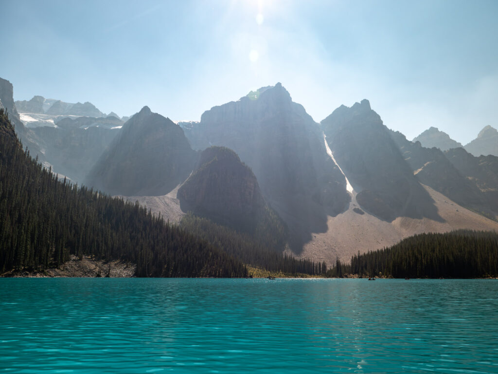 Sunshine lighting up Moraine Lake a bright turquoise in Banff National Park