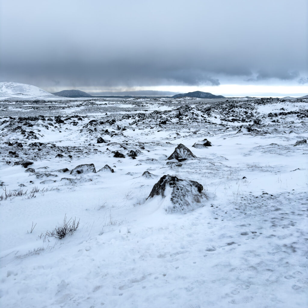 Rocky Icelandic landscape covered in winter snow
