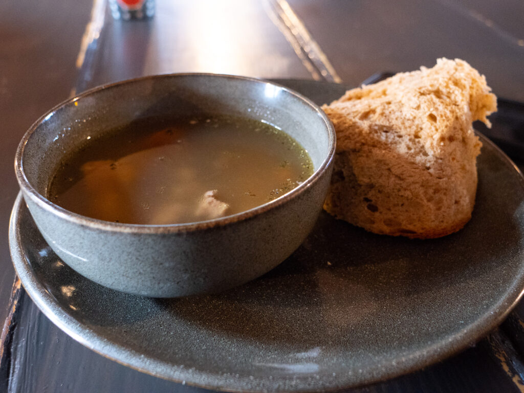 A bowl of traditional Icelandic lamb soup and bread
