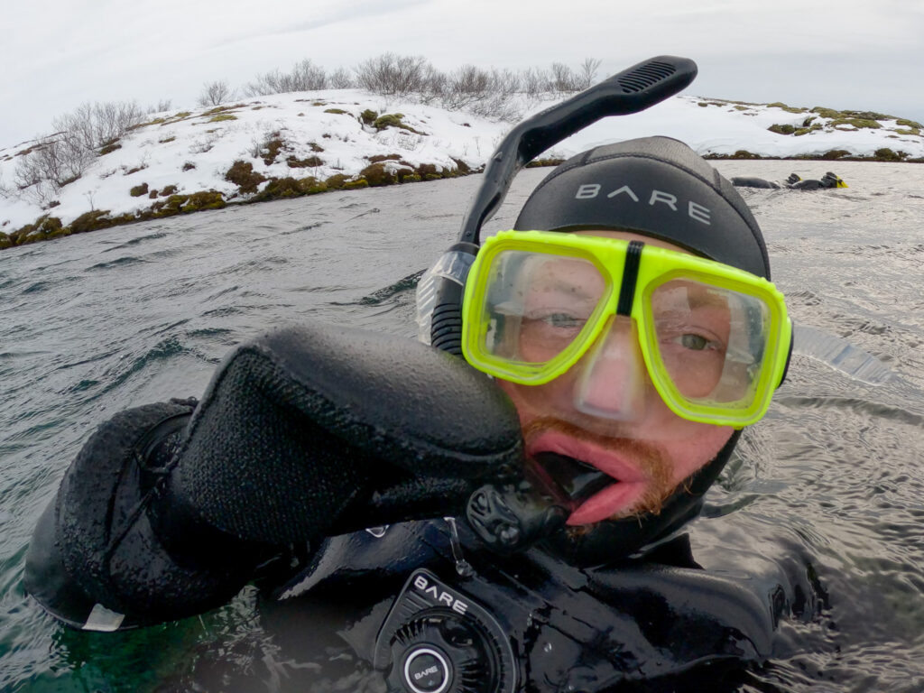 Man snorkeling in snowy conditions