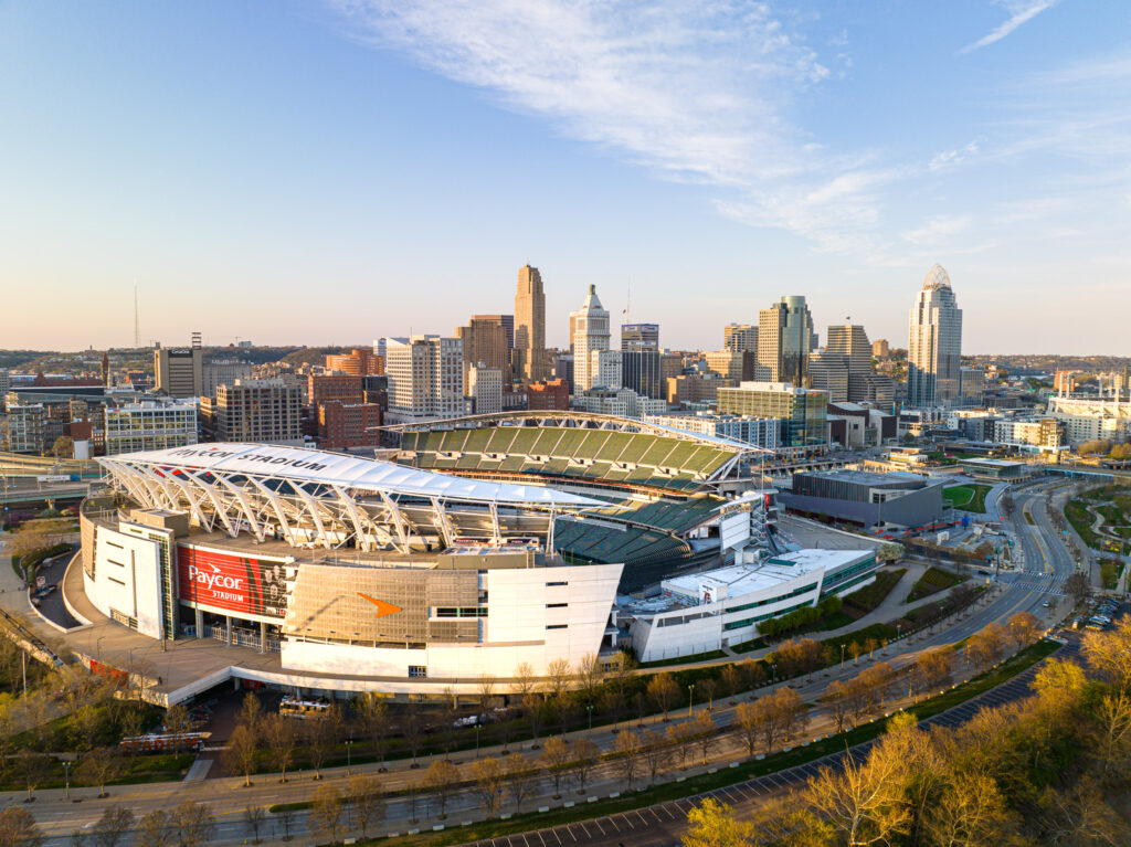 a stadium with a city in the background