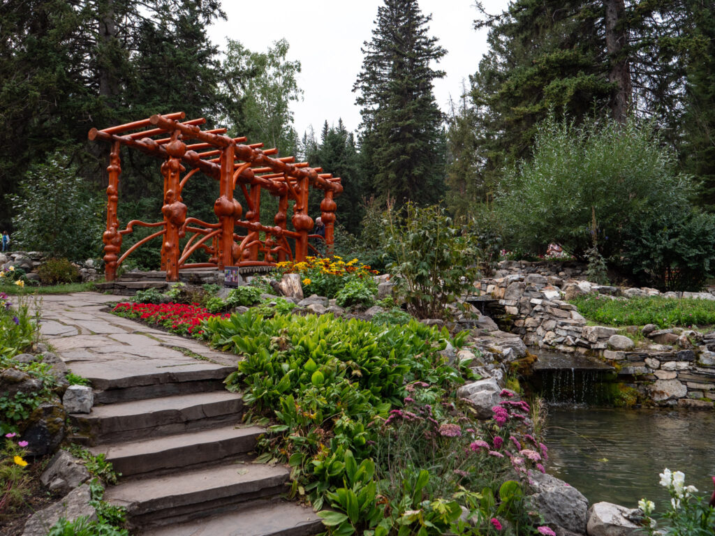 a stone steps leading to a garden