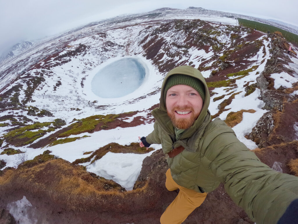 man above icy crater