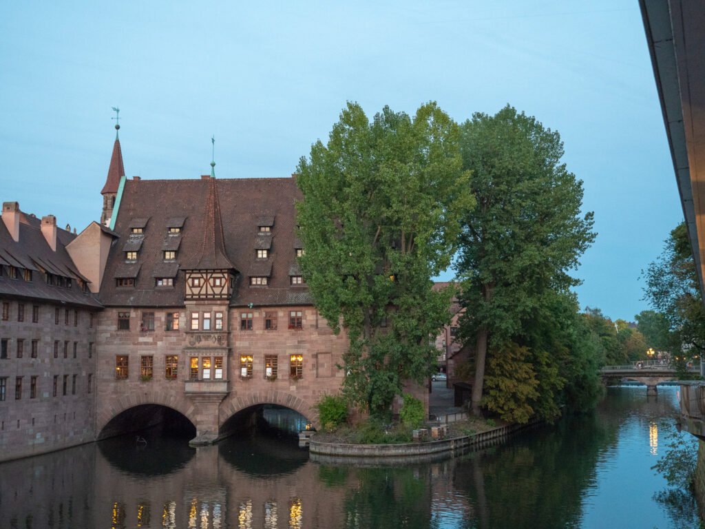 a building with a bridge over water