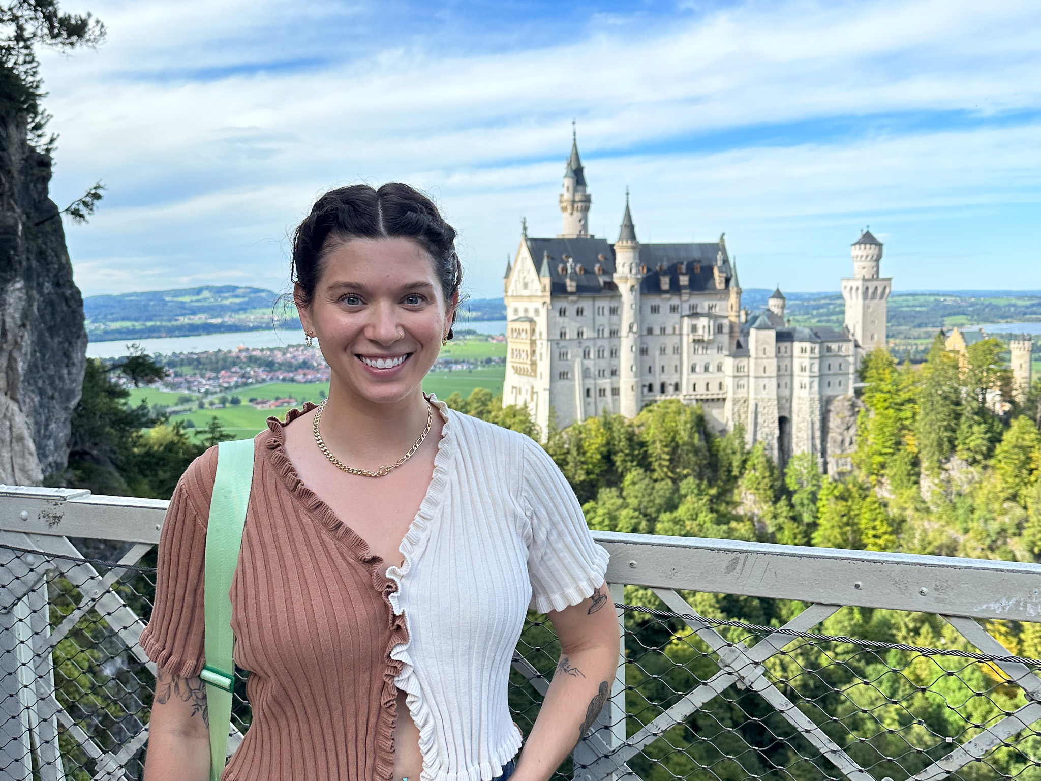 woman in front of castle