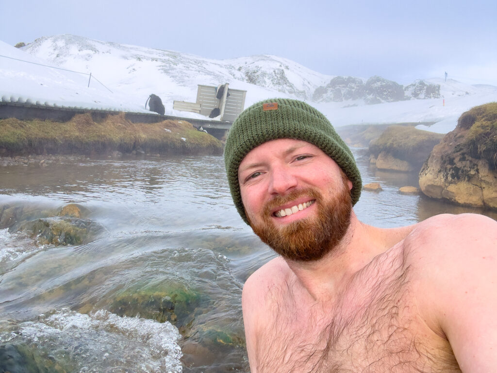 a man taking a selfie in a snowy place